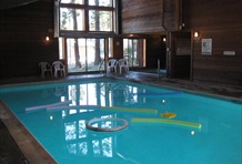 Fireside at the Village by Mammoth Reservation Bureau